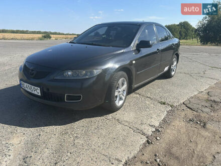 Черный Мазда 6, объемом двигателя 2 л и пробегом 366 тыс. км за 3800 $, фото 1 на Automoto.ua