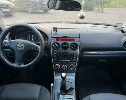 Черный Мазда 6, объемом двигателя 2 л и пробегом 344 тыс. км за 2900 $, фото 1 на Automoto.ua
