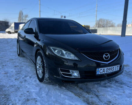 Черный Мазда 6, объемом двигателя 2 л и пробегом 252 тыс. км за 7200 $, фото 1 на Automoto.ua