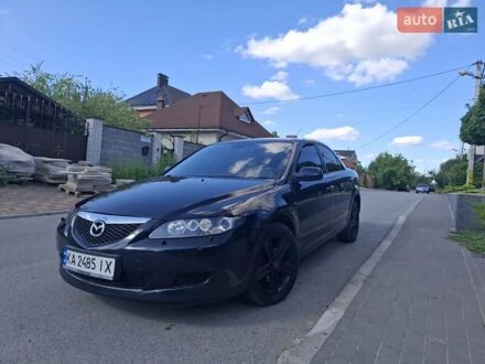 Черный Мазда 6, объемом двигателя 2 л и пробегом 335 тыс. км за 4650 $, фото 1 на Automoto.ua
