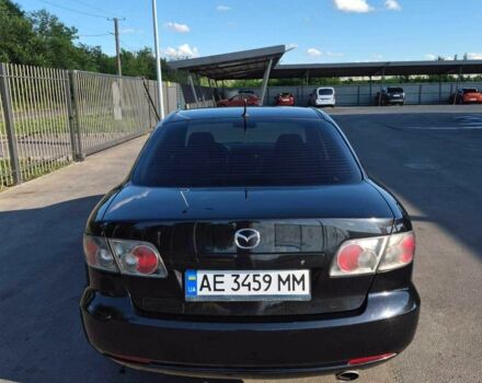 Черный Мазда 6, объемом двигателя 1.8 л и пробегом 210 тыс. км за 5009 $, фото 1 на Automoto.ua