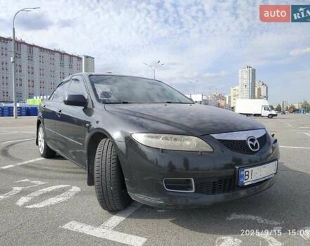 Черный Мазда 6, объемом двигателя 2.3 л и пробегом 199 тыс. км за 3999 $, фото 1 на Automoto.ua