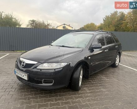 Черный Мазда 6, объемом двигателя 2 л и пробегом 258 тыс. км за 5300 $, фото 1 на Automoto.ua