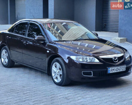 Черный Мазда 6, объемом двигателя 1.8 л и пробегом 243 тыс. км за 5800 $, фото 1 на Automoto.ua