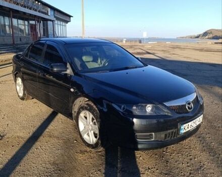 Черный Мазда 6, объемом двигателя 2 л и пробегом 270 тыс. км за 6000 $, фото 1 на Automoto.ua