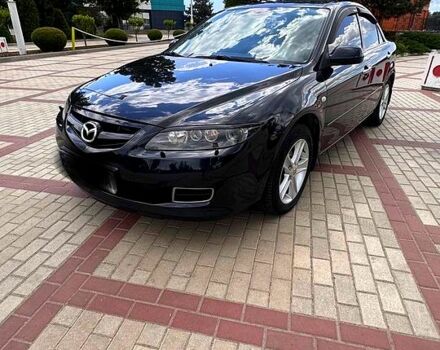 Черный Мазда 6, объемом двигателя 2 л и пробегом 235 тыс. км за 5500 $, фото 1 на Automoto.ua