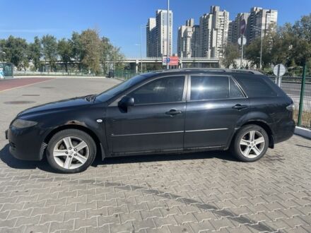 Чорний Мазда 6, об'ємом двигуна 2 л та пробігом 410 тис. км за 4997 $, фото 1 на Automoto.ua