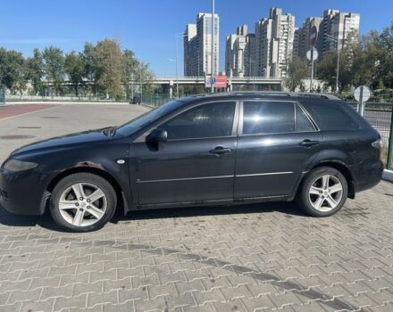Черный Мазда 6, объемом двигателя 2 л и пробегом 410 тыс. км за 4997 $, фото 1 на Automoto.ua