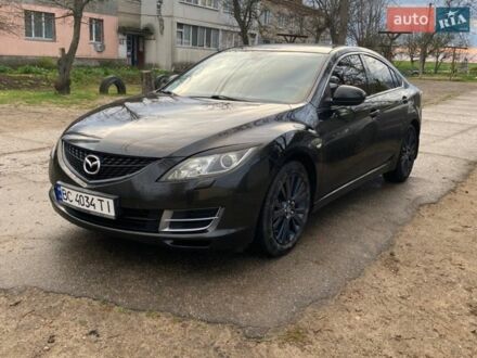 Черный Мазда 6, объемом двигателя 2 л и пробегом 300 тыс. км за 5750 $, фото 1 на Automoto.ua