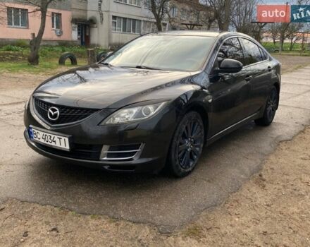 Черный Мазда 6, объемом двигателя 2 л и пробегом 300 тыс. км за 5750 $, фото 1 на Automoto.ua