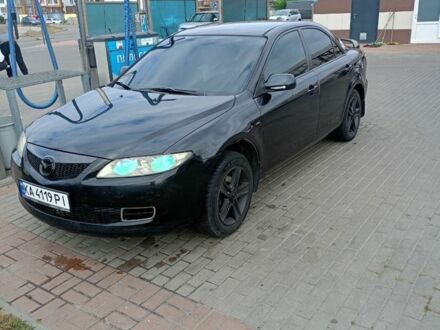 Черный Мазда 6, объемом двигателя 2 л и пробегом 270 тыс. км за 4600 $, фото 1 на Automoto.ua