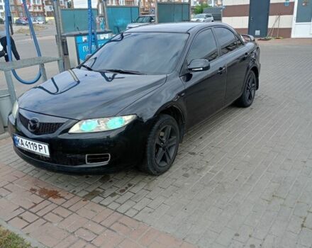 Черный Мазда 6, объемом двигателя 2 л и пробегом 270 тыс. км за 4600 $, фото 1 на Automoto.ua