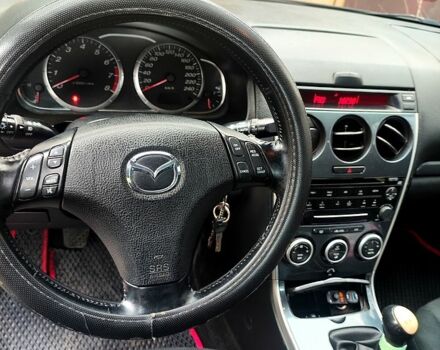 Черный Мазда 6, объемом двигателя 1.8 л и пробегом 320 тыс. км за 3900 $, фото 1 на Automoto.ua