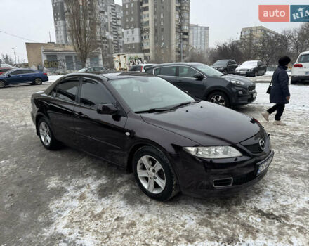 Черный Мазда 6, объемом двигателя 2 л и пробегом 255 тыс. км за 4900 $, фото 1 на Automoto.ua