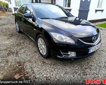 Черный Мазда 6, объемом двигателя 2 л и пробегом 160 тыс. км за 6800 $, фото 1 на Automoto.ua