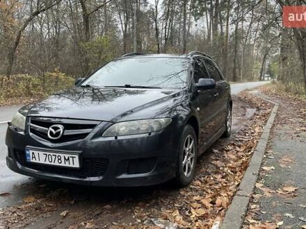 Черный Мазда 6, объемом двигателя 2.3 л и пробегом 293 тыс. км за 5300 $, фото 1 на Automoto.ua
