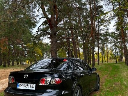 Черный Мазда 6, объемом двигателя 2.3 л и пробегом 180 тыс. км за 6200 $, фото 1 на Automoto.ua