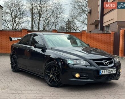 Черный Мазда 6, объемом двигателя 2.3 л и пробегом 215 тыс. км за 5700 $, фото 1 на Automoto.ua