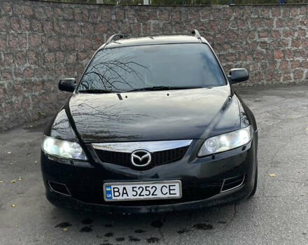 Черный Мазда 6, объемом двигателя 1.8 л и пробегом 251 тыс. км за 6200 $, фото 1 на Automoto.ua