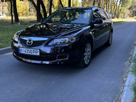 Черный Мазда 6, объемом двигателя 2.3 л и пробегом 201 тыс. км за 5700 $, фото 1 на Automoto.ua