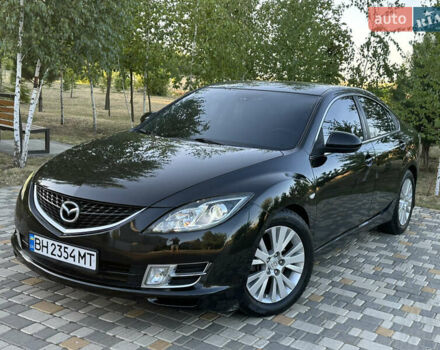 Черный Мазда 6, объемом двигателя 2 л и пробегом 187 тыс. км за 6900 $, фото 1 на Automoto.ua