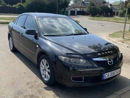Черный Мазда 6, объемом двигателя 2 л и пробегом 182 тыс. км за 5100 $, фото 1 на Automoto.ua