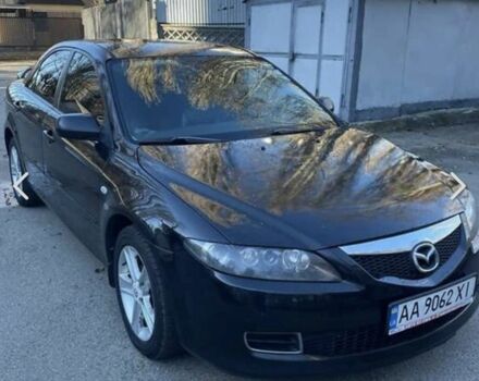 Черный Мазда 6, объемом двигателя 2 л и пробегом 320 тыс. км за 4300 $, фото 1 на Automoto.ua
