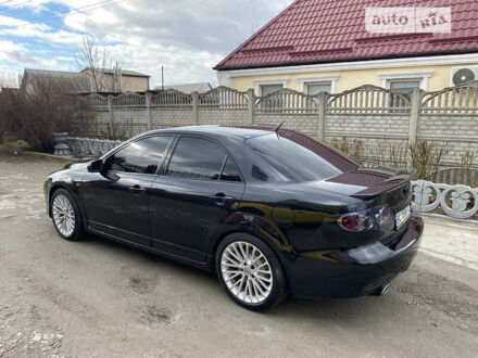 Чорний Мазда 6, об'ємом двигуна 2.3 л та пробігом 200 тис. км за 5400 $, фото 1 на Automoto.ua