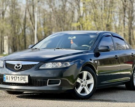 Черный Мазда 6, объемом двигателя 2 л и пробегом 314 тыс. км за 5800 $, фото 1 на Automoto.ua