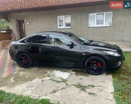 Черный Мазда 6, объемом двигателя 2 л и пробегом 370 тыс. км за 6300 $, фото 1 на Automoto.ua