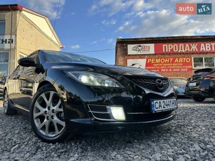 Черный Мазда 6, объемом двигателя 2.5 л и пробегом 257 тыс. км за 6800 $, фото 1 на Automoto.ua