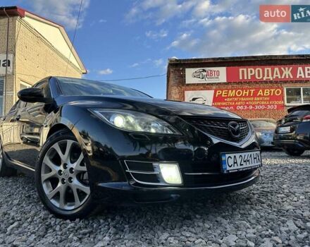 Черный Мазда 6, объемом двигателя 2.5 л и пробегом 257 тыс. км за 6800 $, фото 1 на Automoto.ua