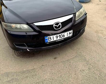 Черный Мазда 6, объемом двигателя 2 л и пробегом 250 тыс. км за 4700 $, фото 1 на Automoto.ua
