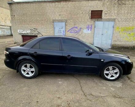 Черный Мазда 6, объемом двигателя 2 л и пробегом 245 тыс. км за 5500 $, фото 1 на Automoto.ua