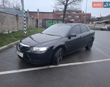 Черный Мазда 6, объемом двигателя 2 л и пробегом 335 тыс. км за 4650 $, фото 1 на Automoto.ua