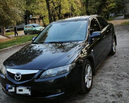 Черный Мазда 6, объемом двигателя 2 л и пробегом 247 тыс. км за 5289 $, фото 1 на Automoto.ua