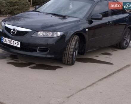 Черный Мазда 6, объемом двигателя 1.8 л и пробегом 262 тыс. км за 4300 $, фото 1 на Automoto.ua