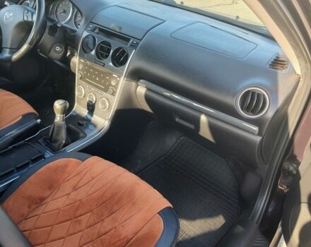 Чорний Мазда 6, об'ємом двигуна 1.8 л та пробігом 243 тис. км за 5300 $, фото 1 на Automoto.ua