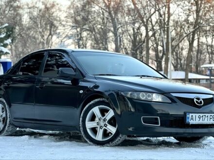 Чорний Мазда 6, об'ємом двигуна 2 л та пробігом 322 тис. км за 6988 $, фото 1 на Automoto.ua