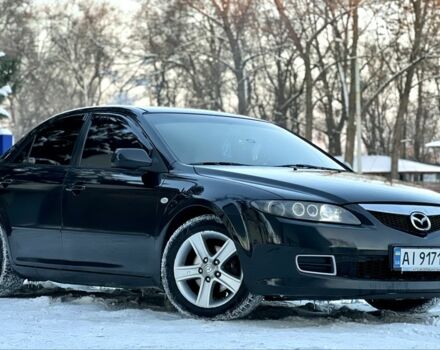 Черный Мазда 6, объемом двигателя 2 л и пробегом 322 тыс. км за 6988 $, фото 1 на Automoto.ua