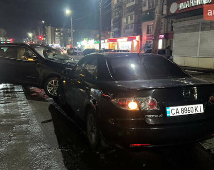 Черный Мазда 6, объемом двигателя 1.8 л и пробегом 230 тыс. км за 2700 $, фото 1 на Automoto.ua