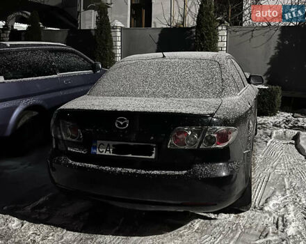 Чорний Мазда 6, об'ємом двигуна 1.8 л та пробігом 245 тис. км за 2500 $, фото 1 на Automoto.ua