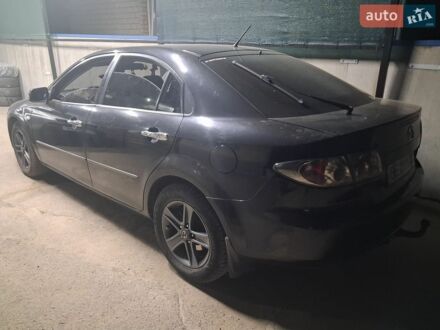 Черный Мазда 6, объемом двигателя 2 л и пробегом 309 тыс. км за 3000 $, фото 1 на Automoto.ua