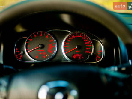 Черный Мазда 6, объемом двигателя 2.3 л и пробегом 129 тыс. км за 6300 $, фото 1 на Automoto.ua