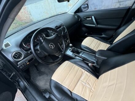 Черный Мазда 6, объемом двигателя 2 л и пробегом 150 тыс. км за 3000 $, фото 1 на Automoto.ua