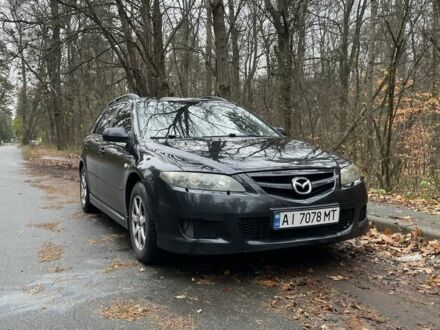 Черный Мазда 6, объемом двигателя 2.3 л и пробегом 293 тыс. км за 5300 $, фото 1 на Automoto.ua