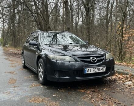 Черный Мазда 6, объемом двигателя 2.3 л и пробегом 293 тыс. км за 5300 $, фото 1 на Automoto.ua