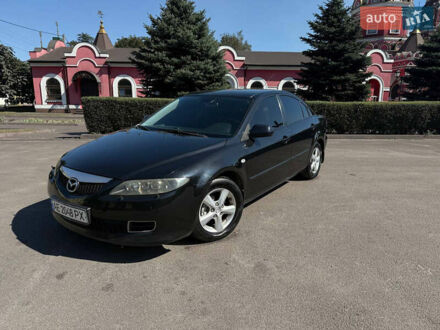 Черный Мазда 6, объемом двигателя 2 л и пробегом 200 тыс. км за 6000 $, фото 1 на Automoto.ua