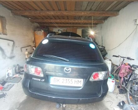 Черный Мазда 6, объемом двигателя 2 л и пробегом 250 тыс. км за 2200 $, фото 1 на Automoto.ua