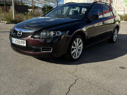 Черный Мазда 6, объемом двигателя 2.3 л и пробегом 202 тыс. км за 5250 $, фото 1 на Automoto.ua